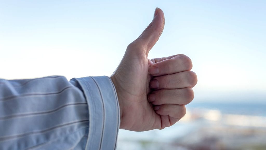 thumbs up shown with the hand