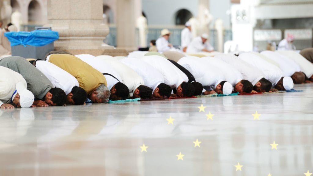 People prostrating in prayer