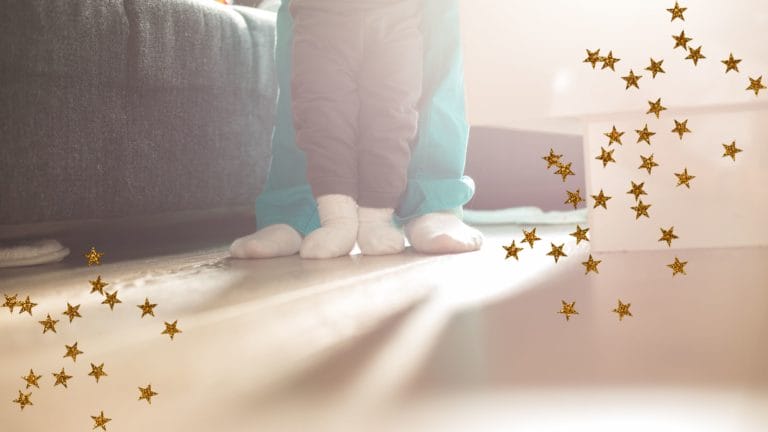 Mommy's feet with socks and a baby walking with socks